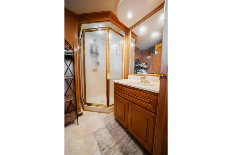  Yacht Photos Pics Luxurious bathroom in 2004 Stardust Cruisers houseboat with shower and vanity.