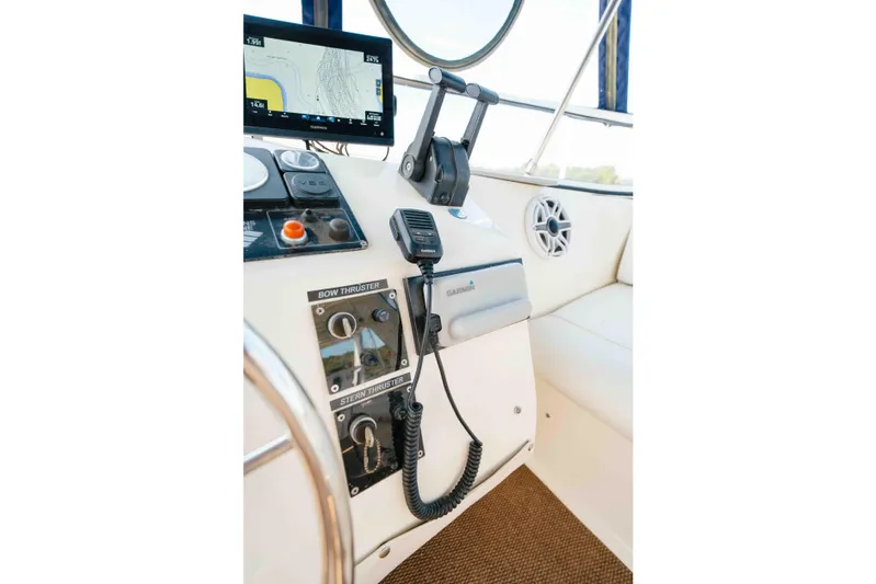  Yacht Photos Pics Control panel of a 2004 Stardust Cruisers houseboat with navigation equipment.