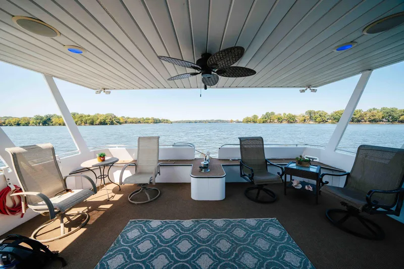  Yacht Photos Pics 2004 Stardust Cruisers houseboat deck with seating, ceiling fan, and scenic lake view.