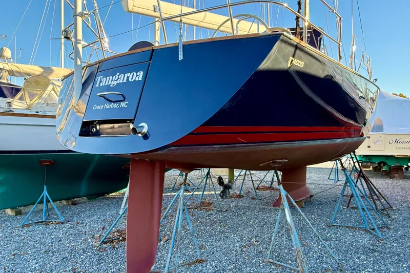 Tangaroa Yacht Photos Pics Tartan 4000 sailboat from 2015 on stands, named Tangaroa, in a boatyard.