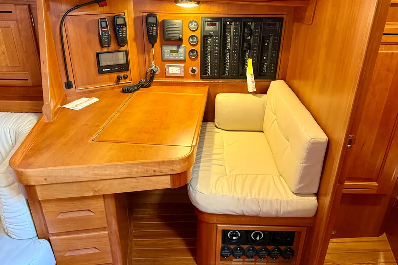 Tangaroa Yacht Photos Pics Cozy Tartan 4000 yacht navigation station with wood finish and communication equipment, 2015 model.