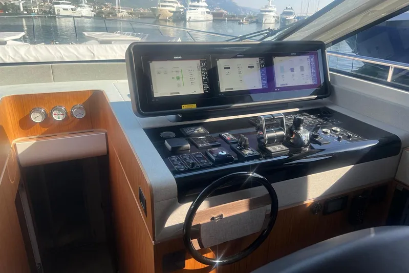  Yacht Photos Pics Cockpit of 2025 Ferretti Yachts 670 with advanced navigation systems and controls.