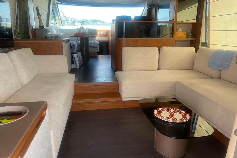  Yacht Photos Pics Luxurious interior of 2025 Ferretti Yachts 670 with elegant seating and modern design.