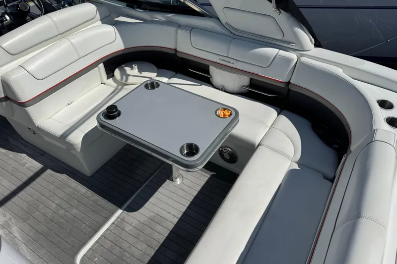  Yacht Photos Pics 2014 Formula 350 Sun Sport boat interior with white seating and table.