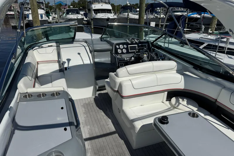  Yacht Photos Pics 2014 Formula 350 Sun Sport boat interior with white seating and control panel.