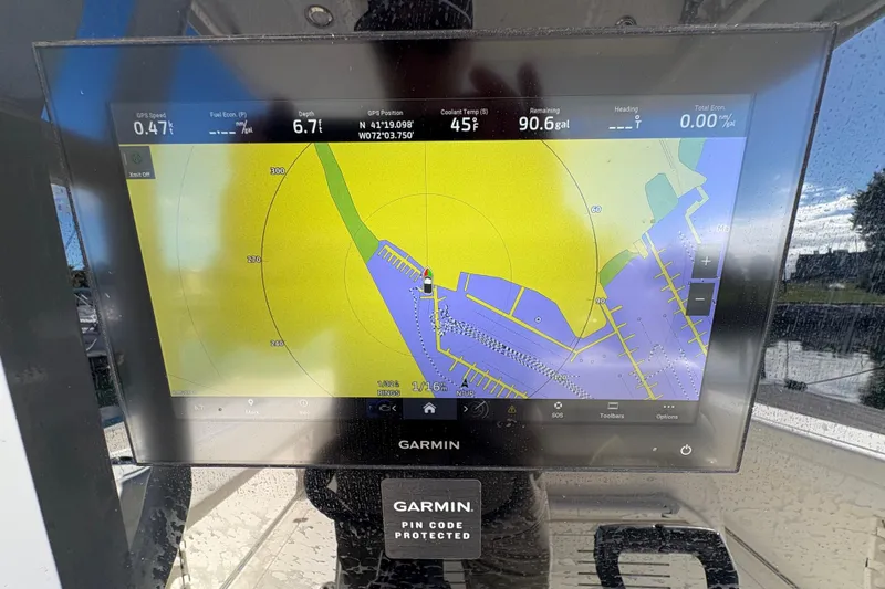  Yacht Photos Pics Garmin navigation display on 2022 Cobia 280 Center Console boat, showing map and data.
