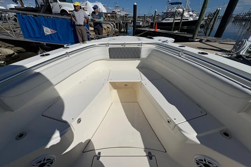  Yacht Photos Pics 2022 Cobia 280 Center Console boat interior at marina dock.