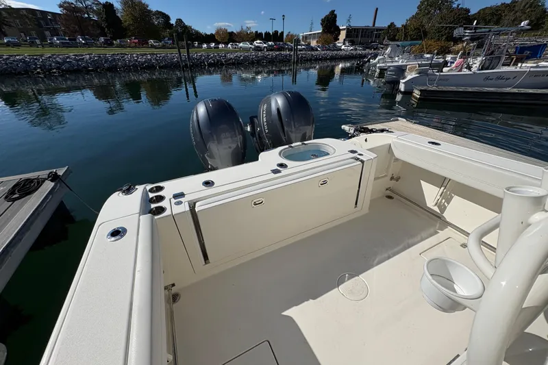  Yacht Photos Pics 2022 Cobia 280 Center Console boat docked with dual engines and spacious deck.
