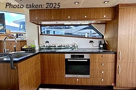  Yacht Photos Pics Luxurious kitchen interior of 2015 Mazarin 72 Sport Fly yacht, photo taken in 2025.