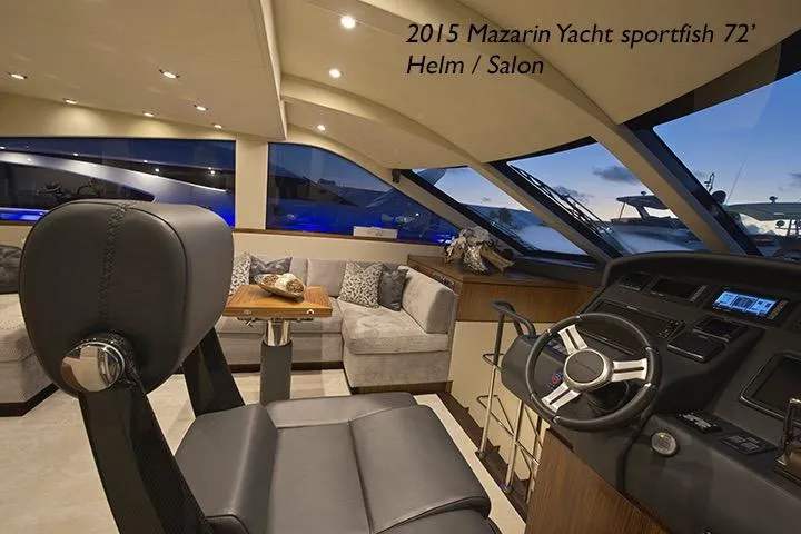  Yacht Photos Pics Luxurious interior of 2015 Mazarin 72 Sport Fly yacht helm and salon area.