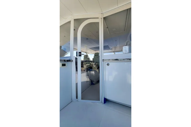  Yacht Photos Pics Interior view of 2019 Regency P65 yacht, featuring sleek design and modern amenities.