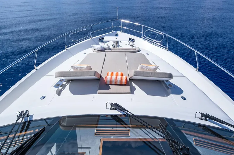  Yacht Photos Pics Luxurious 2019 Regency P65 yacht deck with sun loungers and ocean view.