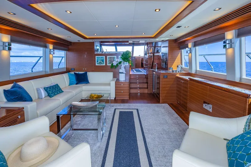  Yacht Photos Pics Luxurious 2019 Regency P65 yacht interior with elegant seating, ocean views, and modern decor.