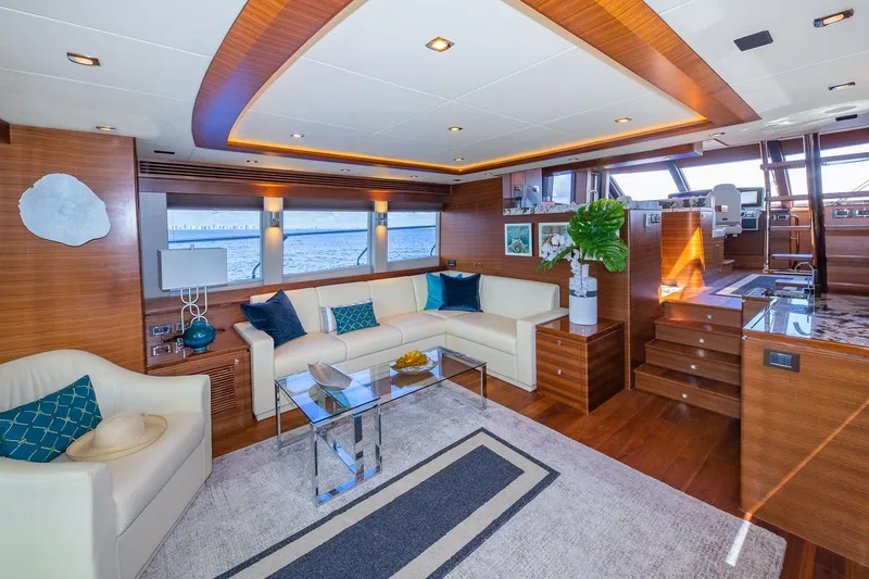  Yacht Photos Pics Luxurious 2019 Regency P65 yacht interior with elegant wood finishes and modern furnishings.