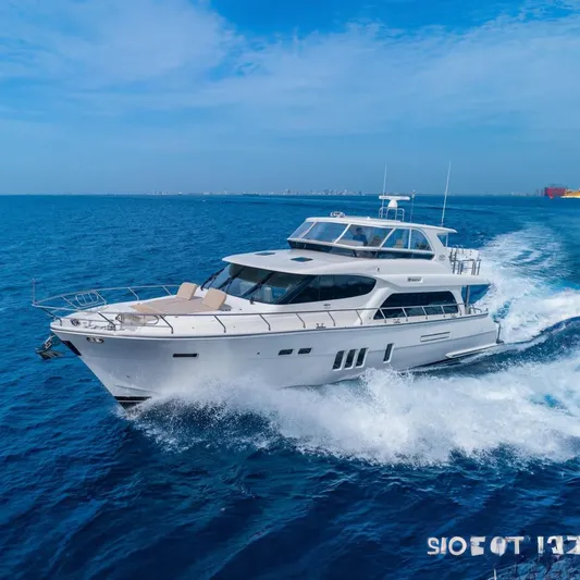  Yacht Photos Pics Luxurious 2019 Regency P65 yacht cruising on open blue sea.