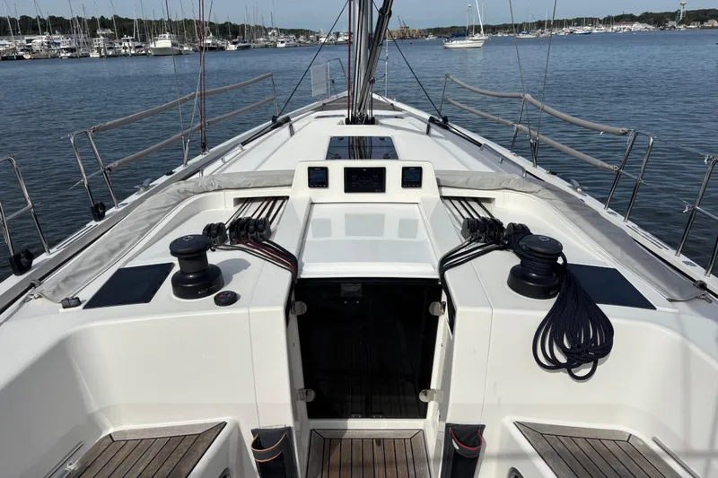 Katara Yacht Photos Pics 2023 X-Yachts X4³ MkII sailboat cockpit with winches and ropes, docked in a marina.