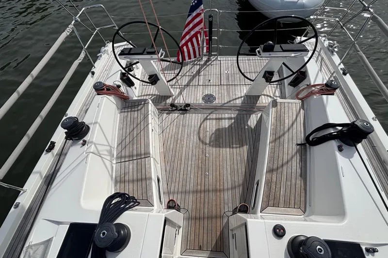 Katara Yacht Photos Pics 2023 X-Yachts X4³ MkII sailboat cockpit with dual steering wheels and teak decking.