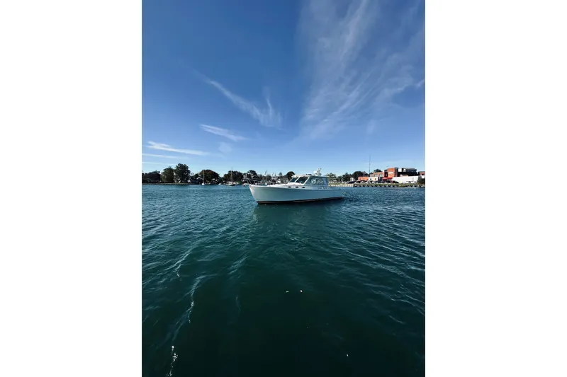 2021 Back Cove 37 Yacht Photos Pics 2021 Back Cove 37 boat on calm water under clear blue sky.
