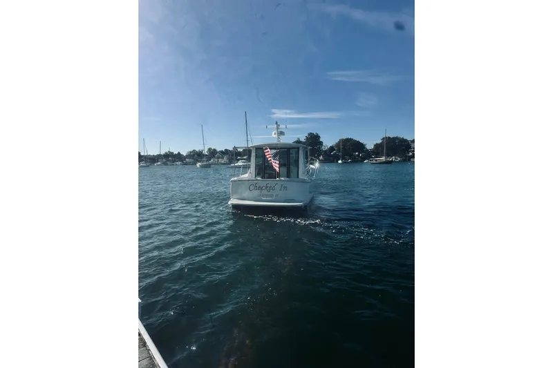 2021 Back Cove 37 Yacht Photos Pics 2021 Back Cove 37 boat on calm water with clear blue sky.