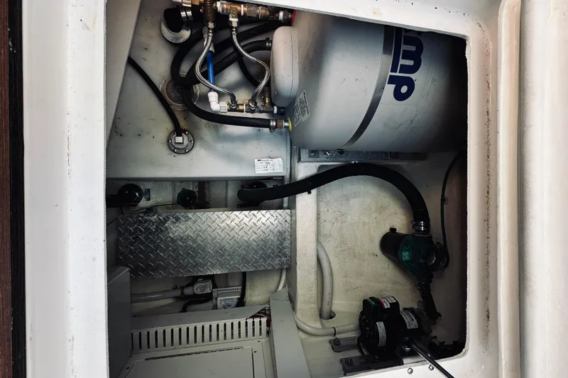 2021 Back Cove 37 Yacht Photos Pics Engine compartment of 2021 Back Cove 37 boat, showing mechanical components and wiring.
