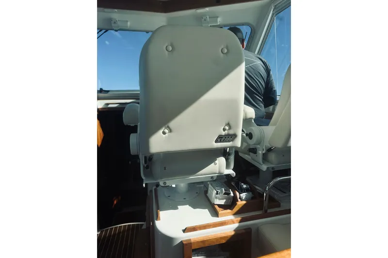 2021 Back Cove 37 Yacht Photos Pics Captain's seat on 2021 Back Cove 37 boat, interior view.