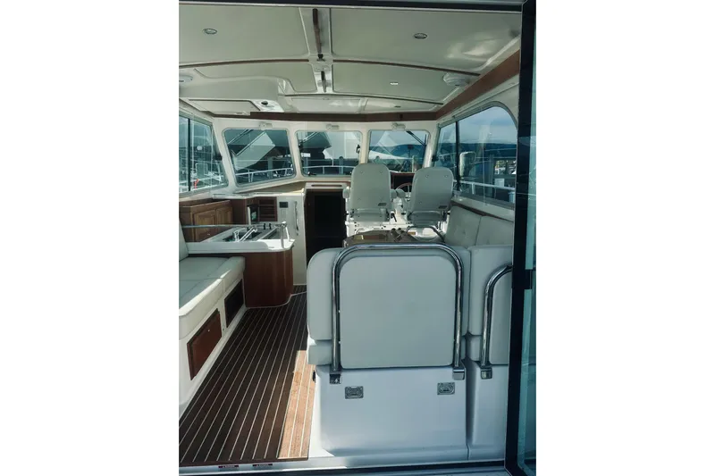 2021 Back Cove 37 Yacht Photos Pics Interior view of 2021 Back Cove 37 yacht, featuring sleek seating and modern design.