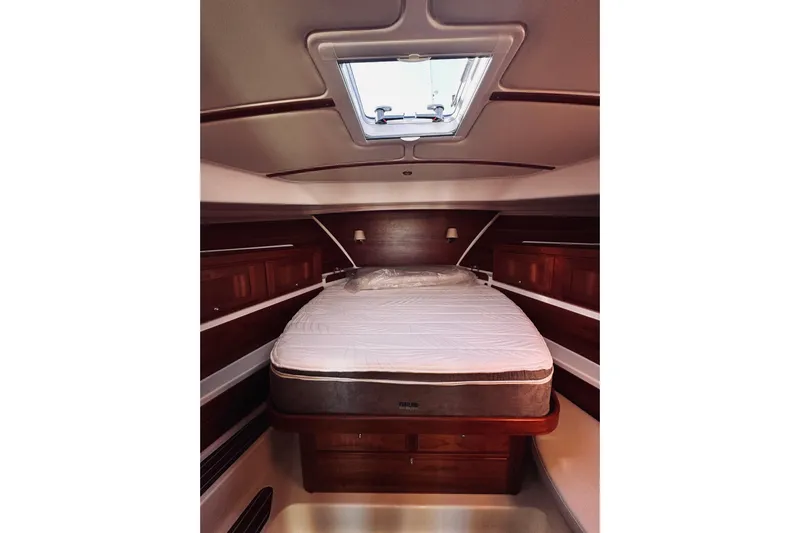 2021 Back Cove 37 Yacht Photos Pics Luxurious cabin interior of 2021 Back Cove 37 yacht with elegant wood finish.