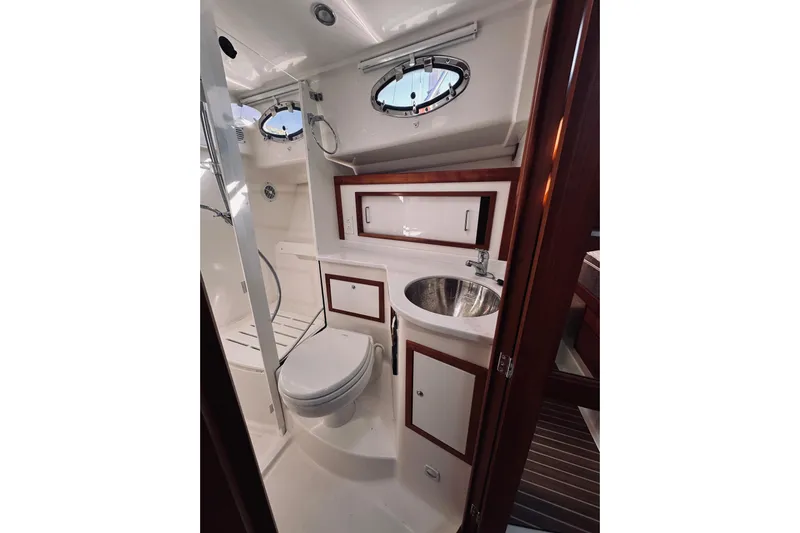2021 Back Cove 37 Yacht Photos Pics Luxurious bathroom in 2021 Back Cove 37 yacht with modern fixtures and elegant design.