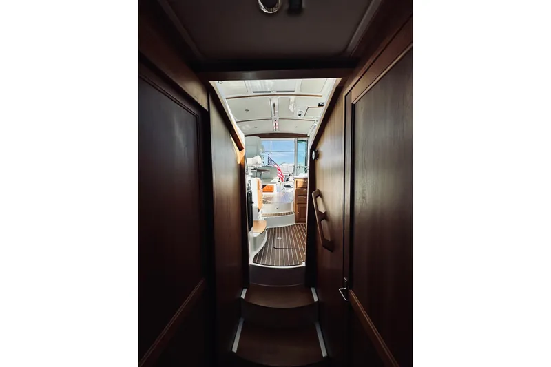 2021 Back Cove 37 Yacht Photos Pics Interior view of 2021 Back Cove 37 yacht, showcasing elegant wood finishes and modern design.