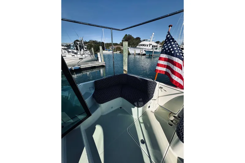 2021 Back Cove 37 Yacht Photos Pics 2021 Back Cove 37 boat with American flag, docked in marina.