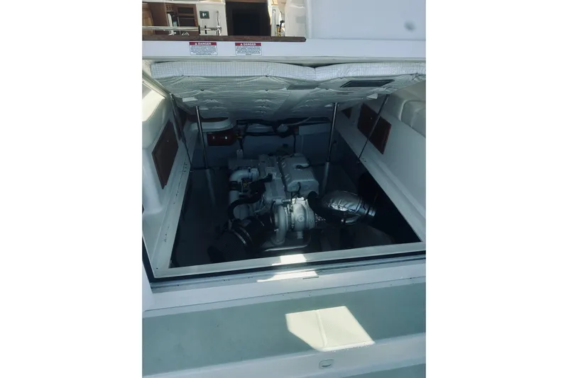 2021 Back Cove 37 Yacht Photos Pics Engine compartment of a 2021 Back Cove 37 boat, showcasing mechanical components.