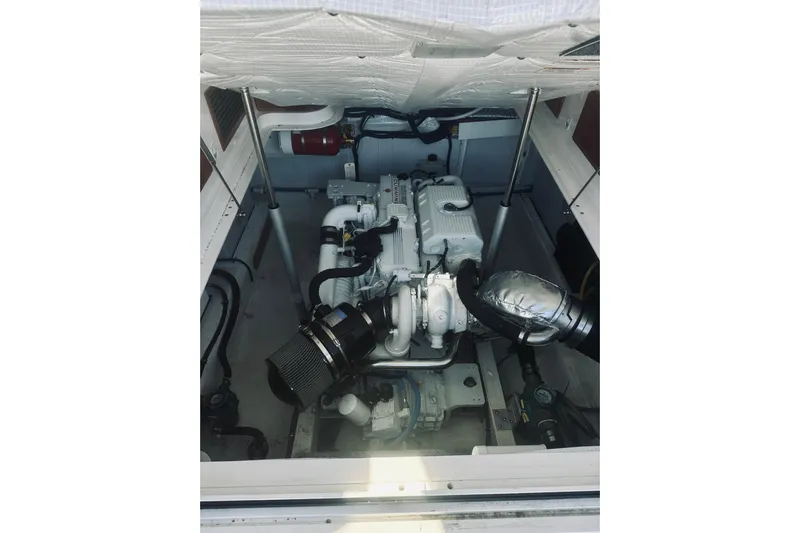 2021 Back Cove 37 Yacht Photos Pics Engine compartment of a 2021 Back Cove 37 boat, showcasing mechanical components.