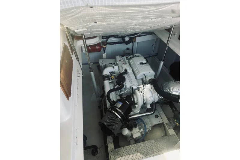 2021 Back Cove 37 Yacht Photos Pics Engine compartment of a 2021 Back Cove 37 boat, showcasing mechanical components.