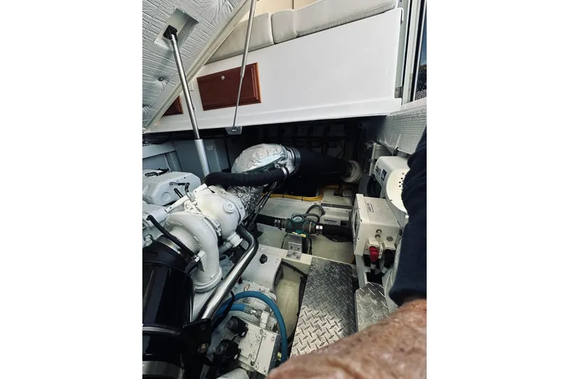 2021 Back Cove 37 Yacht Photos Pics Engine compartment of a 2021 Back Cove 37 boat, showcasing mechanical components.