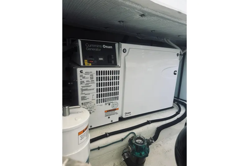 2021 Back Cove 37 Yacht Photos Pics Cummins Onan generator in 2021 Back Cove 37 yacht engine room.