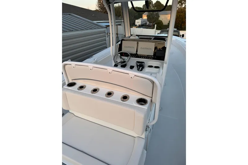  Yacht Photos Pics 2025 Sea Hunt Gamefish 27 Coffin Box boat interior with Garmin displays and seating.