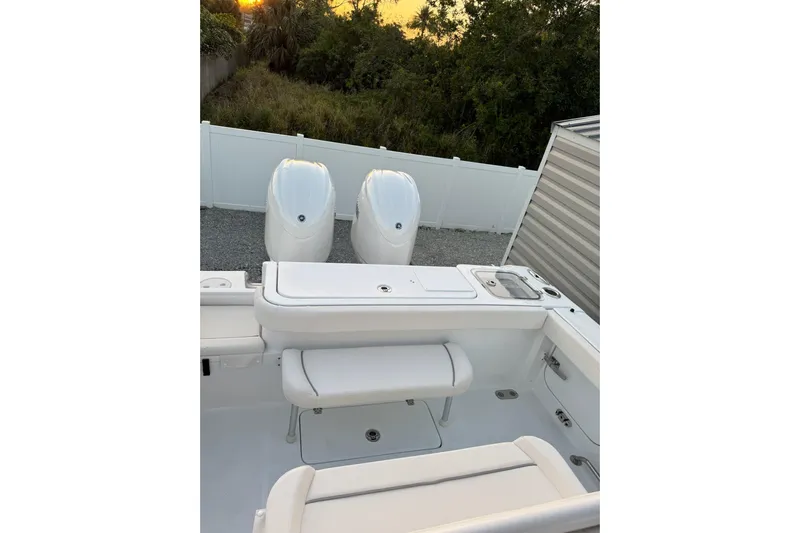  Yacht Photos Pics 2025 Sea Hunt Gamefish 27 Coffin Box boat with dual engines, white interior, and seating.