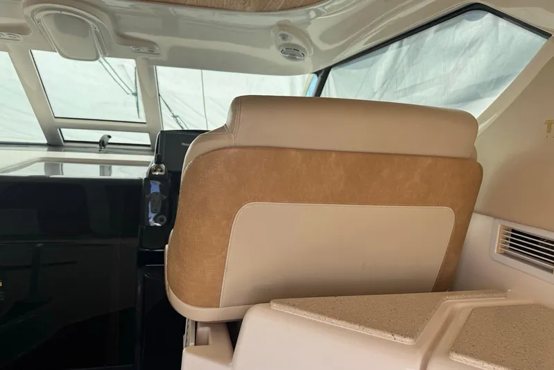  Yacht Photos Pics Interior of a 2008 Tiara Sovran 43 yacht, featuring a luxurious helm seat.