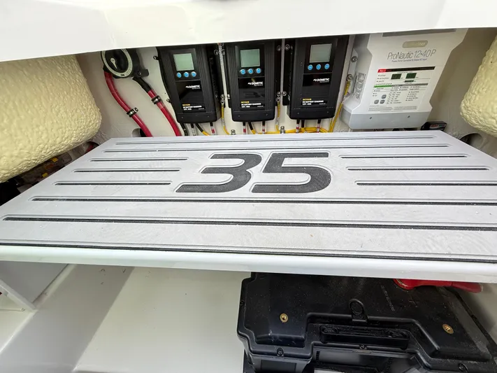 Storm Gray Yacht Photos Pics 2025 Regulator 35 boat electrical panel with control systems and wiring.