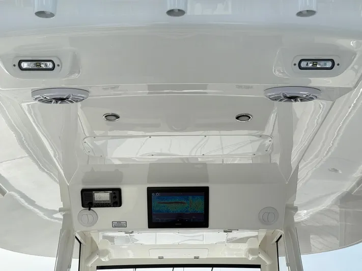 Storm Gray Yacht Photos Pics 2025 Regulator 35 boat interior with modern electronics and sleek design.