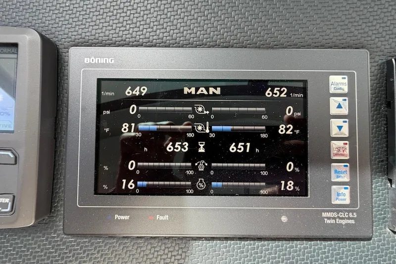  Yacht Photos Pics Digital engine display on 2021 Riviera 50 Sports Motor Yacht dashboard.