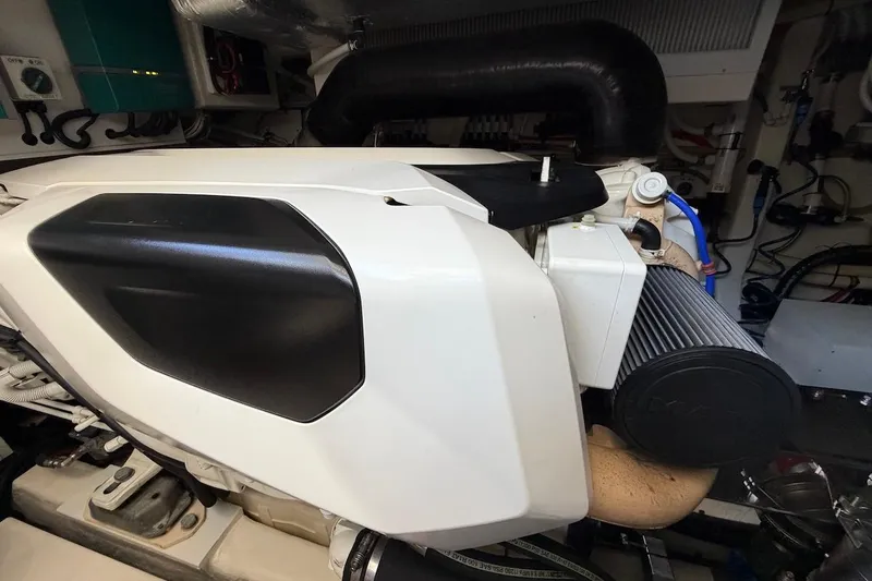  Yacht Photos Pics Engine compartment of 2021 Riviera 50 Sports Motor Yacht, showcasing modern mechanical components.