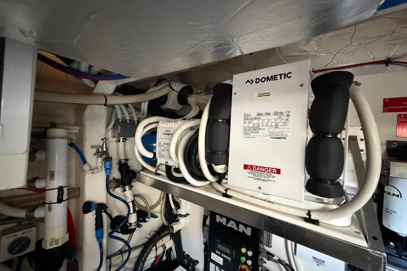  Yacht Photos Pics Engine room of 2021 Riviera 50 Sports Motor Yacht with Dometic air conditioning system.