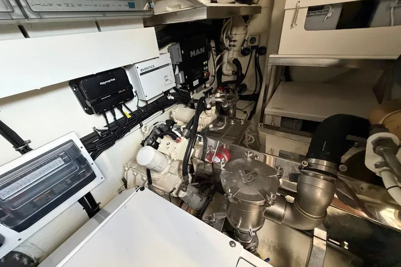  Yacht Photos Pics Engine room of 2021 Riviera 50 Sports Motor Yacht with advanced equipment and wiring.
