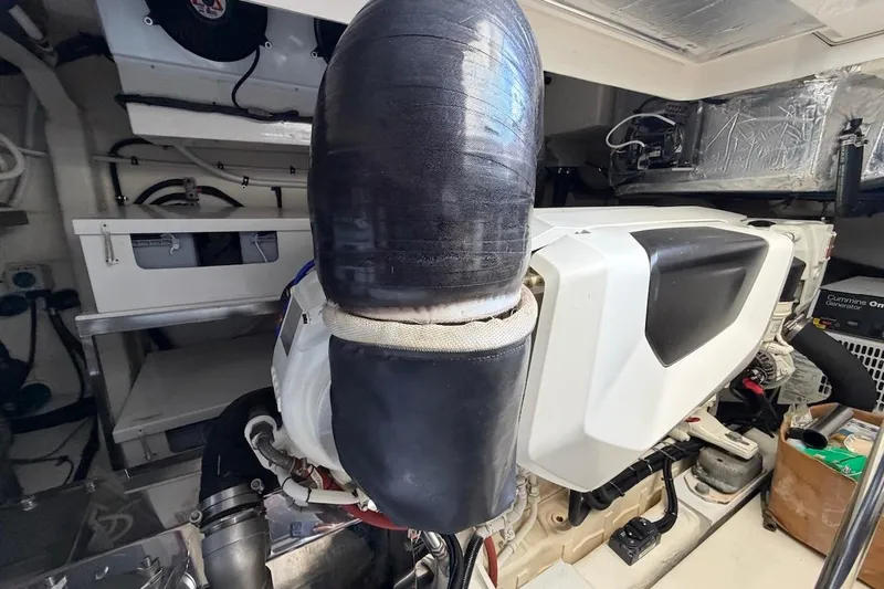  Yacht Photos Pics Engine room of 2021 Riviera 50 Sports Motor Yacht, showcasing mechanical components and systems.