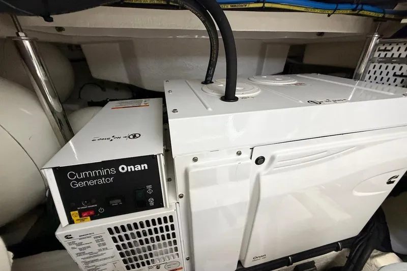  Yacht Photos Pics Cummins Onan generator in 2021 Riviera 50 Sports Motor Yacht engine room.
