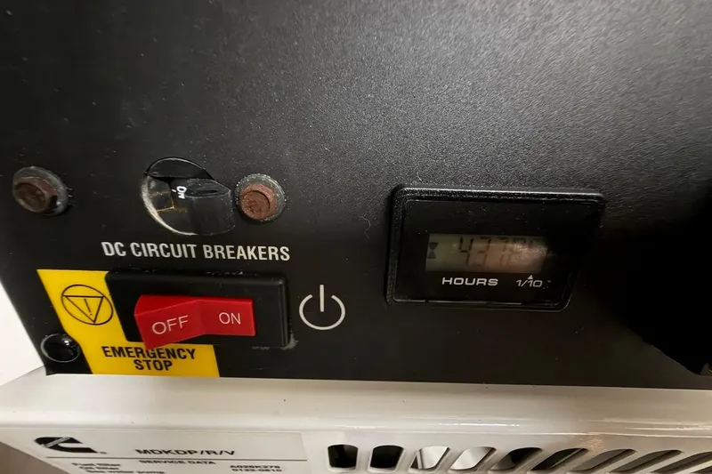  Yacht Photos Pics Control panel of 2021 Riviera 50 Sports Motor Yacht with circuit breakers and hour meter.