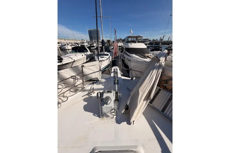 All The Way Yacht Photos Pics 1984 Hartman-Palmer 60 Flush Deck Motor Yacht docked in marina, sunny day.