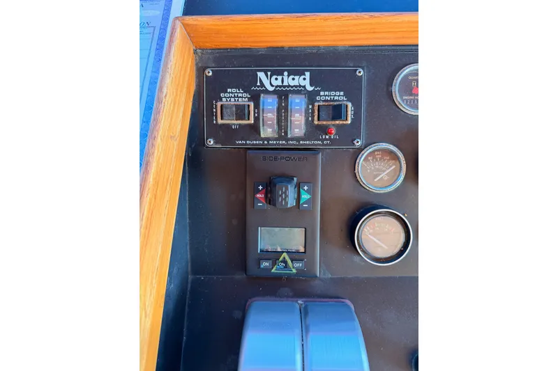 All The Way Yacht Photos Pics Control panel of a 1984 Hartman-Palmer 60 Flush Deck Motor Yacht with gauges and switches.