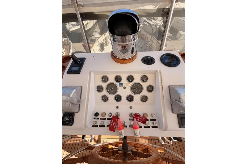 All The Way Yacht Photos Pics Control panel of a 1984 Hartman-Palmer 60 Flush Deck Motor Yacht with gauges and controls.